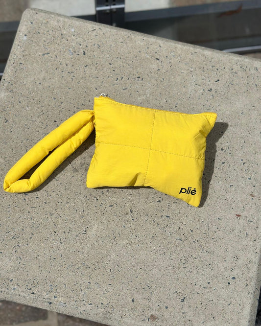 FREE Pliē Wrist Pouch