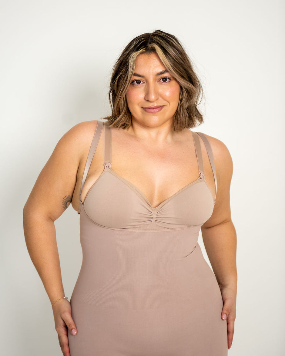 Model wearing Emana Body Braless Medium Shorts in base color